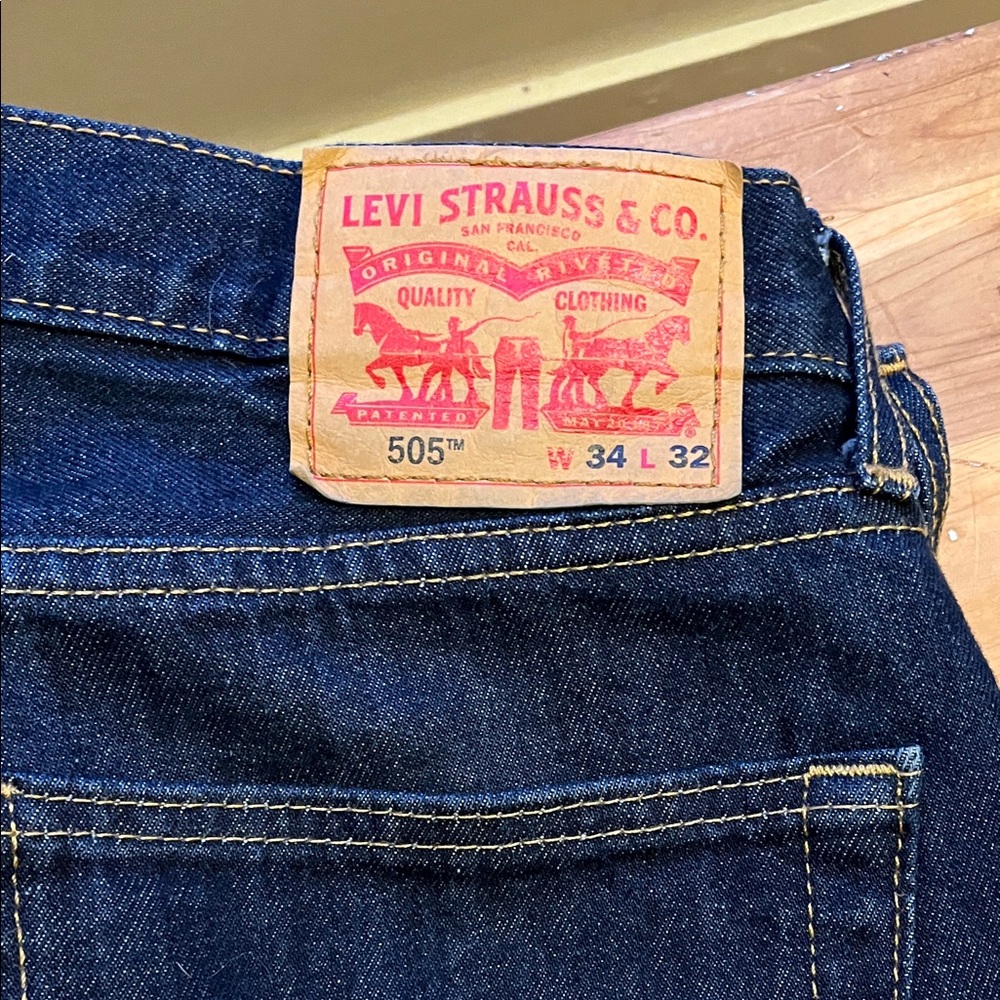 Levi's Dark Blue Straight Leg Men's Jeans with Tan Patch